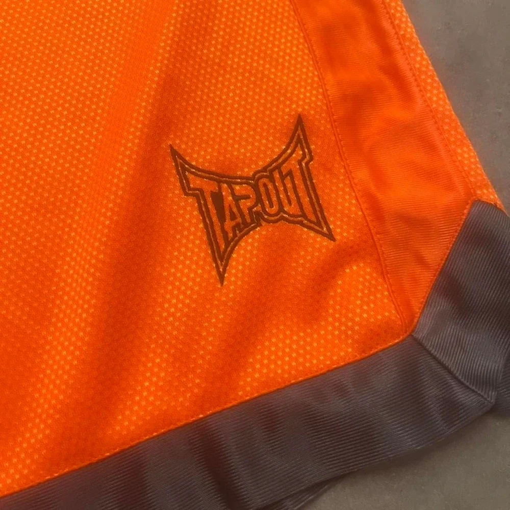 Vintage Y2K loose fit Tapout Mens‎ orange shorts skater